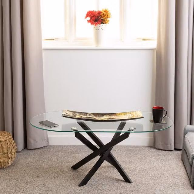 Seconique Sheldon Oval Coffee Table with Black Metal X-Frame and Transparent Glass Top