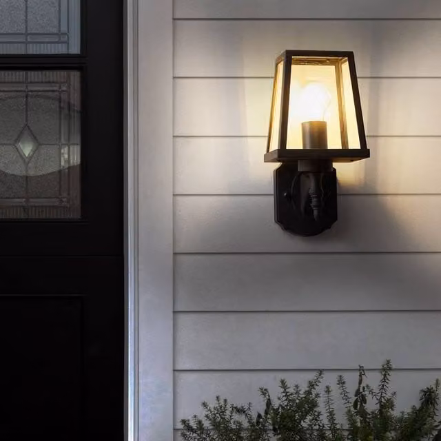 Wyld and Coco Matte Black Metal Outdoor Wall Lantern with Transparent Glass Shade – 1