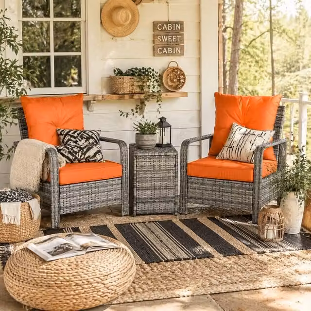 Wyld Haus Nola Nora 3 Piece Rattan Bistro Set with 72L Storage Table in Grey and Orange – 1