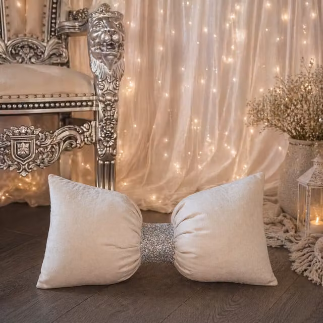 Fabricnco Ltd Plain Square Plush Velvet Bow Cushion in Beige