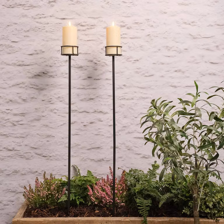 Set of 2 Black Metal Adjustable Outdoor Candle Stakes with TruGlow Pillar Candles featuring Flicker Effect and Timer