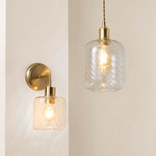 ValueLights Emery Swirl Glass Wall Light with Bulb in Brushed Gold and Transparent Glass