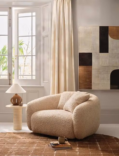 Barker and Stonehouse Cocoon Swivel Snuggle Chair in Beige Boucle Fabric