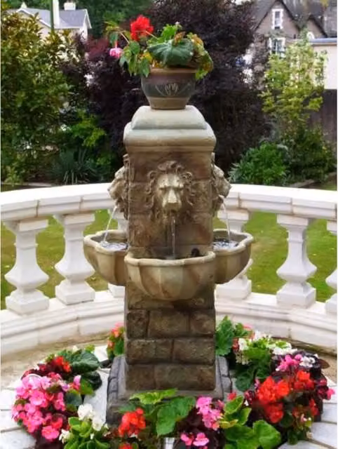 Primrose Brown 4 Lion Faces Freestanding Polyresin Water Feature Fountain with Lights