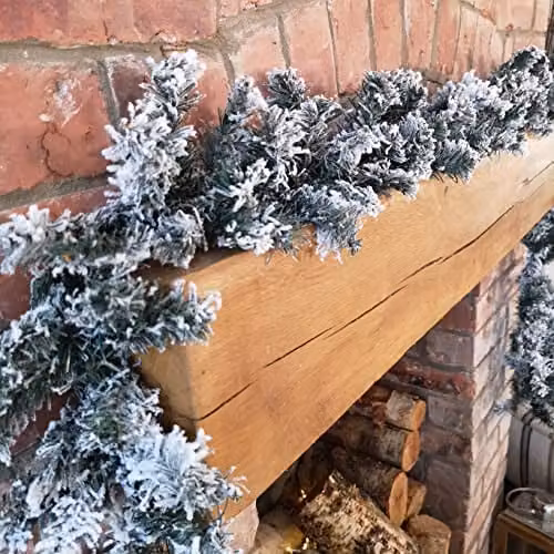 Samuel Alexander 2.7m Snow Flocked Woodcote Fir Christmas Garland in Green – 1