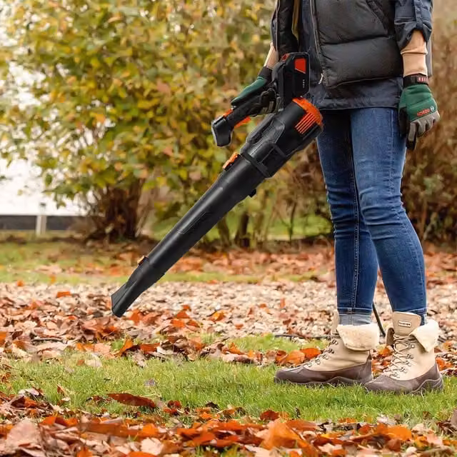 Komore Cordless Handheld Leaf Blower with Rechargeable Battery in Black and Orange
