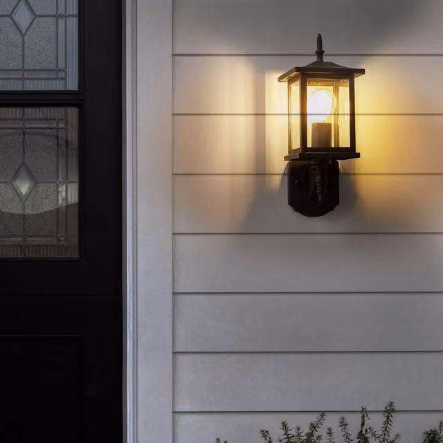 Wyld and Coco Modern Black Metal and Glass Outdoor Wall Lantern