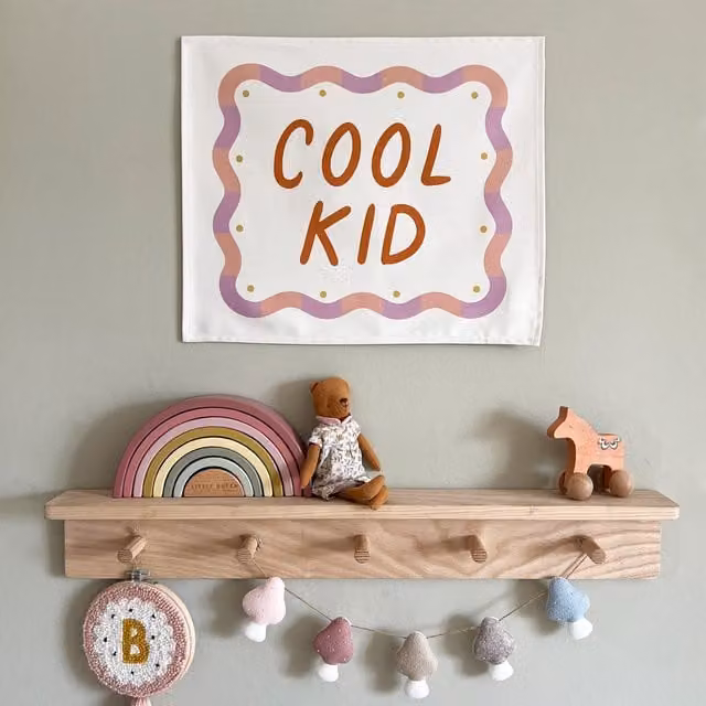 Kid of the Village Cool Kid Hanging Textile Banner in Orange and Purple – 1