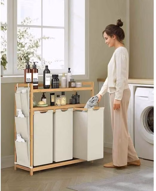 The Bazaarist 3 Compartment Bamboo Laundry Hamper with Shelf and Removable Bags in White and Beige – 1