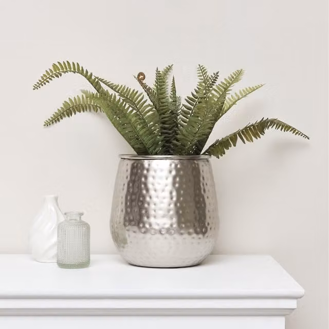 Melody Maison Modern Round Silver Hammered Metal Tabletop Planter in Black