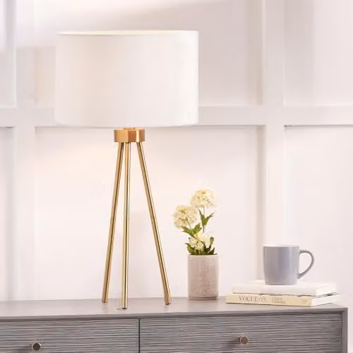 Pacific Lifestyle Metal Tripod Table Lamp with Black Cylinder Fabric Shade in Gold/Brass