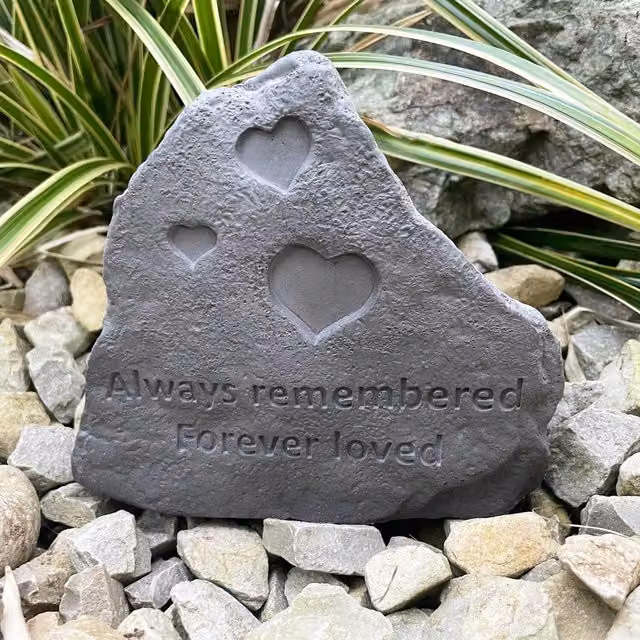 Grey Concrete Memorial Stone with Angels Wings and Feathers Design