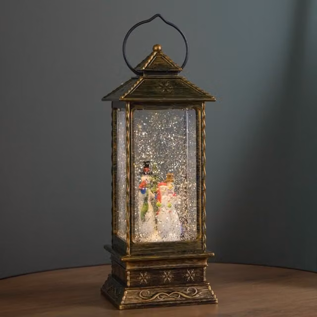 Samuel Alexander Bronze Dual Powered LED Light Up Christmas Water Spinner Lantern with Snowman Scene, Height: 27 cm