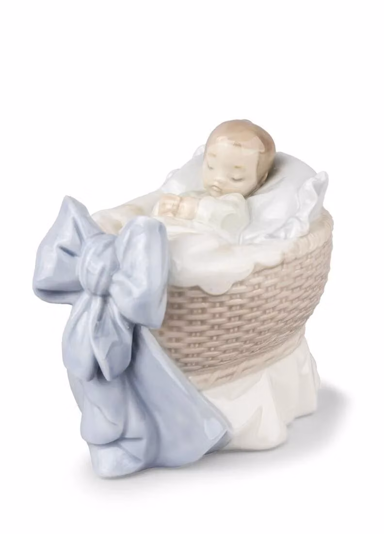 Lladró A New Treasure Boy Porcelain Figurine in White