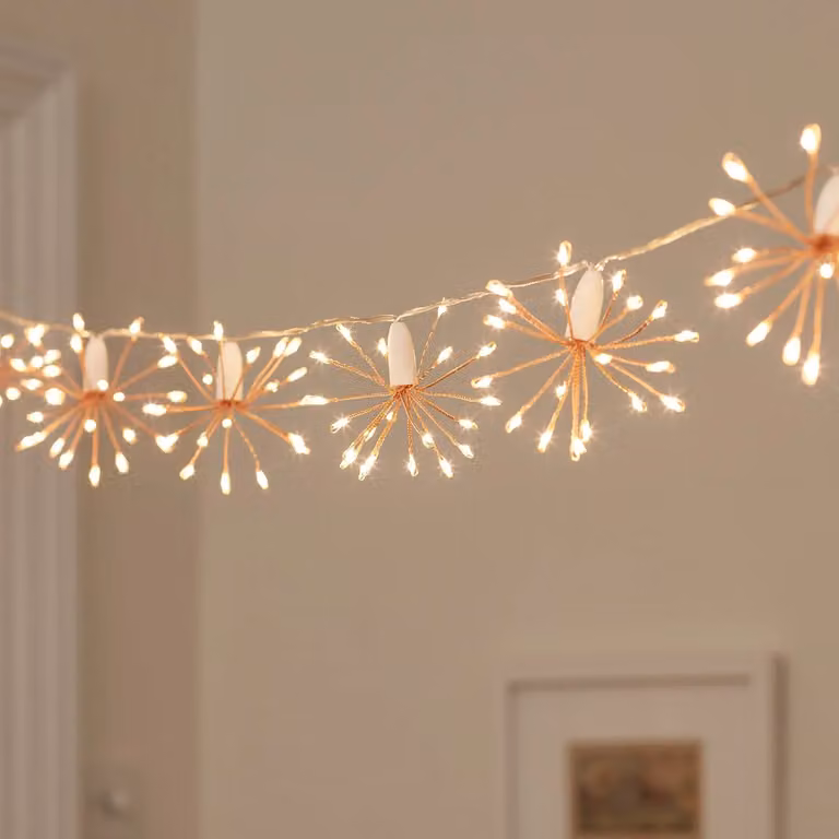 Lights4fun 15 Starburst LED Fairy Lights in Warm White with Gold/Brass Finish