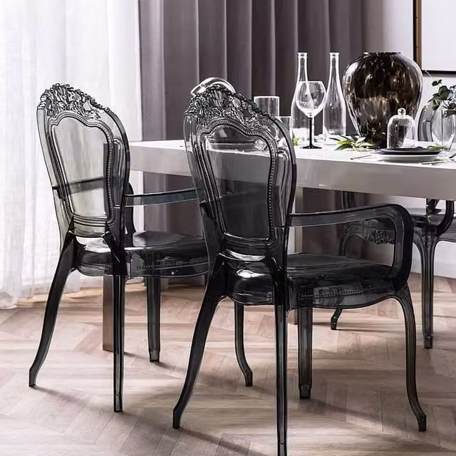 Wyld and Coco Set of 2 Transparent Black Polycarbonate Stackable Dining Chairs with Armrests