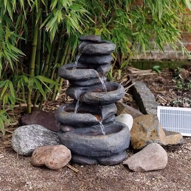 Primrose Solar 4 Tier Stacked Boulder Cascading Water Feature with LED Lights in Grey