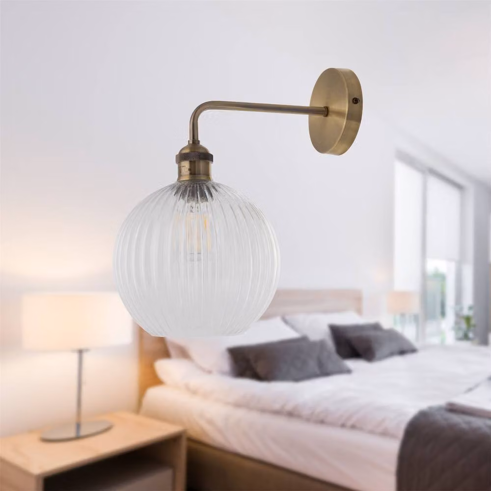 First Choice Lighting Isaac Antique Brass Wall Light with Transparent Glass Shade in Gold – 3