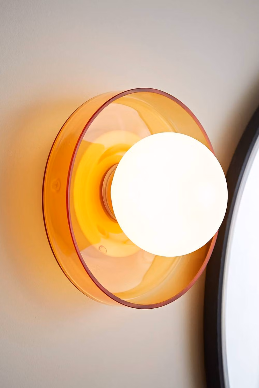 ValueLights Newbury Pair of Amber Glass Globe Bathroom Wall Lights with Gold/Brass Finish IP44 – 2