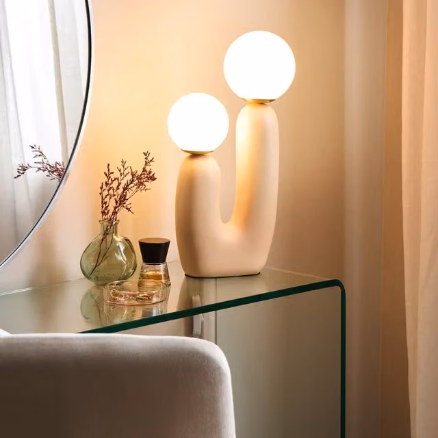 Wyld and Coco Beige Resin Table Lamp with Double Transparent Glass Globe Shades