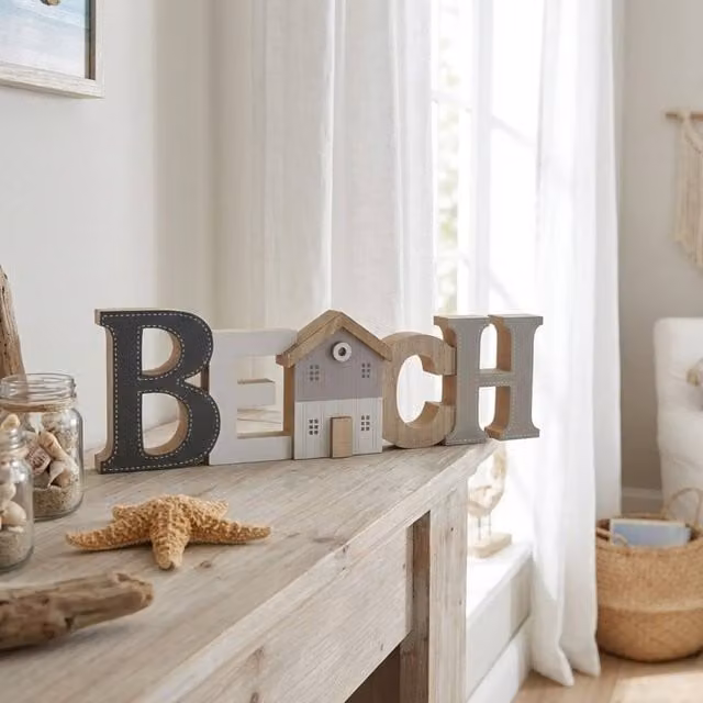 Garden Greatness Nautical Beach Slogan Wooden Wall Plaque in Beige and Multicolour