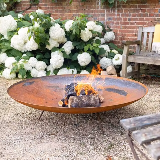 Primrose Corten Steel Fire Pit Fire Bowl in Brown and Orange