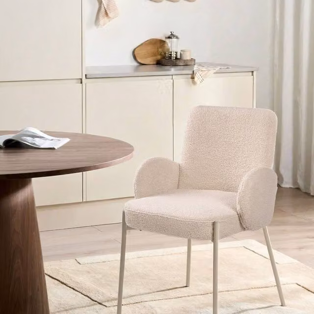 Wyld and Coco Beige Boucle Dining Chair with Retro Modern Design