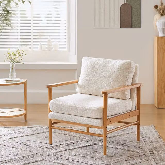 Komore Modern White Bouclé Fabric Lounge Armchair with Armrests and Wood Details