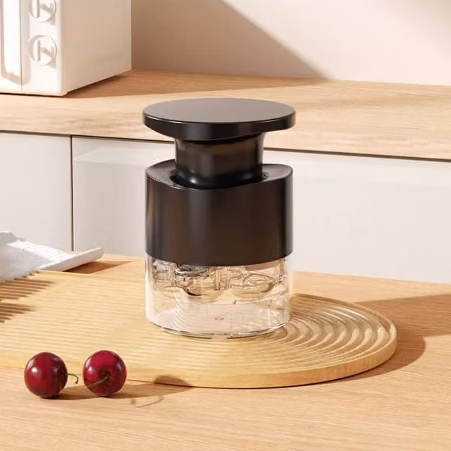 Quipulse Seven-hole Push-button Cherry Pitter in Black – 1