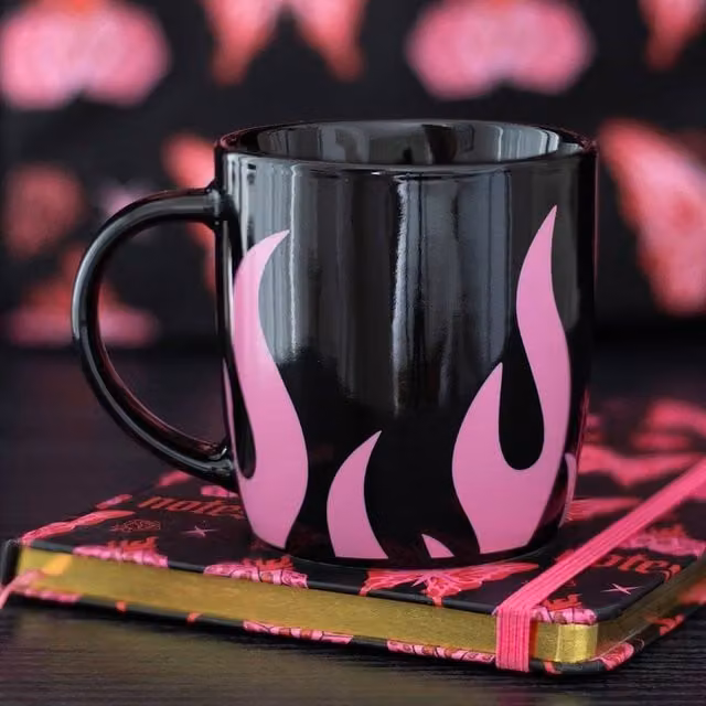 Uniqueful Multicolour Ceramic Mug in Black and Pink