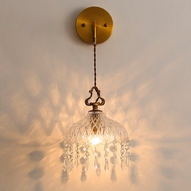 Living Star Gold and Transparent Glass Wall Sconce