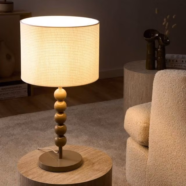 Wyld and Coco Mid-Century Table Lamp with Beige Fabric Drum Shade and Gold Metal Sphere Base