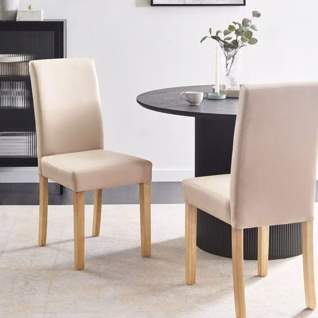 Wyld and Coco Set of 2 Beige Faux Leather Dining Chairs with Rubberwood Legs