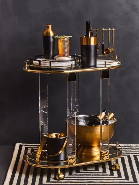 Fifty Five South Orsina 2-Tier Gold Metallic Drinks Trolley with Glass Shelves and Castors, W/D/H: 75 x 43 x 78 cm