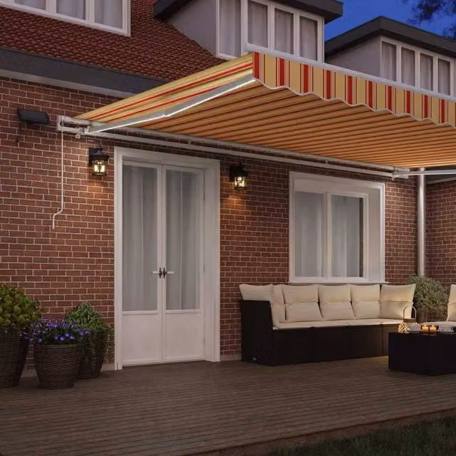 Berkfield Home Manual Retractable Folding Arm Awning with LED, Yellow and Orange Striped Polyester, W: 500 cm, D: 300 cm