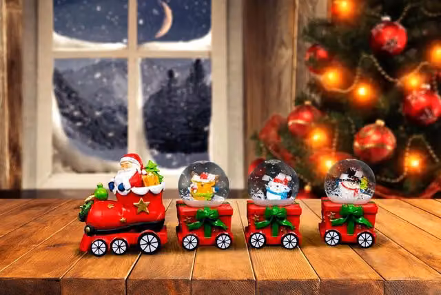 Shatchi Christmas Snowglobe Train Set of 3 Hand Painted Multicolour Tabletop Decorations featuring Santa, Reindeer, and Penguin