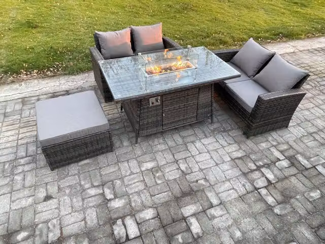 Fimous 4 Piece Poly Rattan Garden Furniture Set with Gas Firepit Dining Table, Sofa and Footstool in Dark Grey