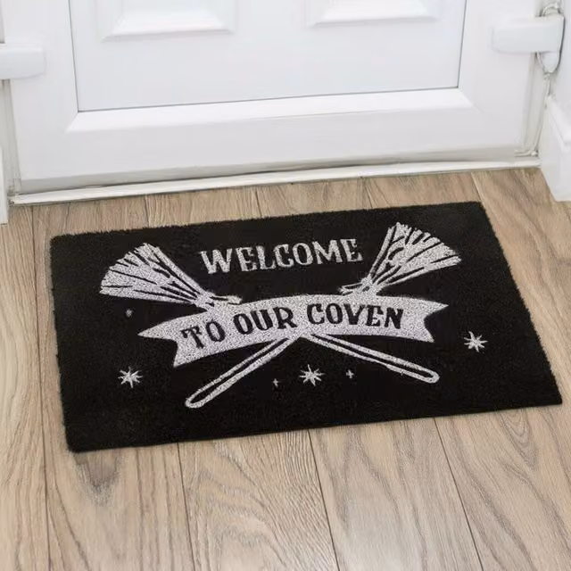 Kingsbury Gifts Black and Silver Graphic Welcome to Our Coven Rectangular Coir Doormat