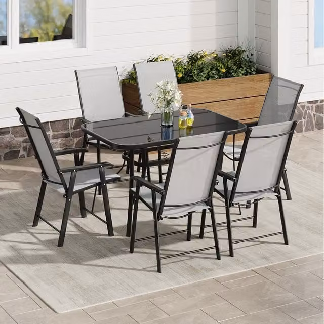 Komore Black Rectangular Tempered Glass Patio Table with 6 Foldable Chairs