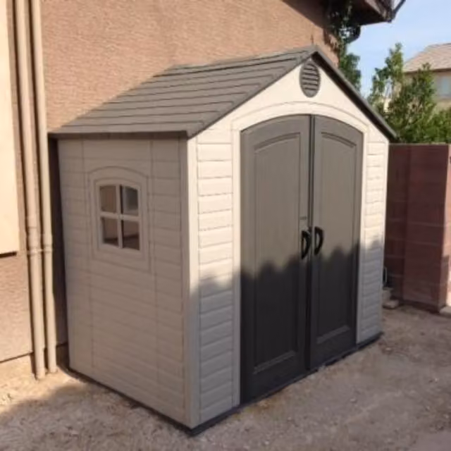 Lifetime Heavy Duty Plastic Garden Shed in Beige and Yellow