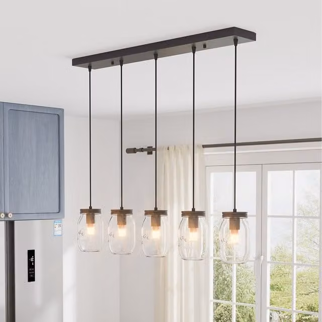 Komore Height-Adjustable Industrial Suspended Pendant Light with Transparent Glass and Black Metal Shade
