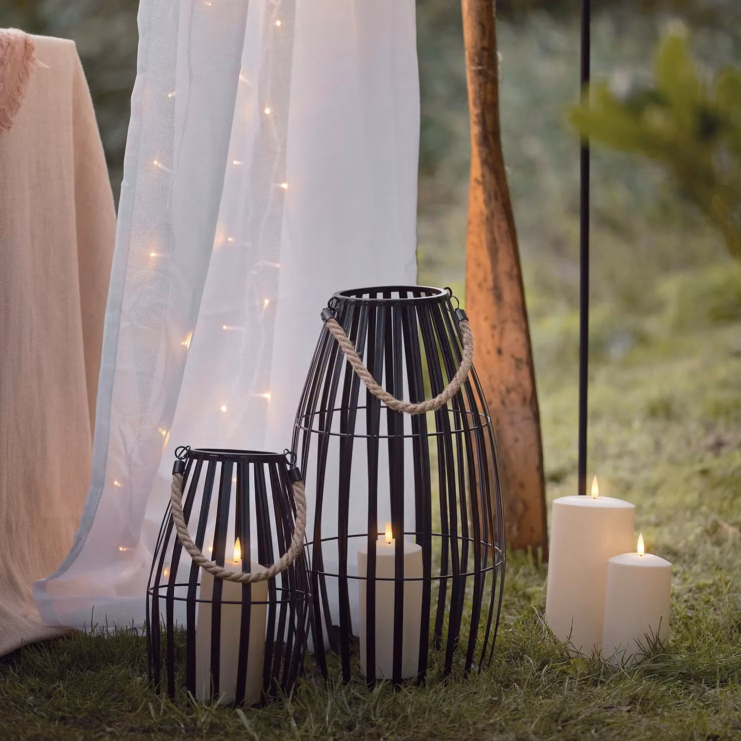 Lights4fun Set of 2 Black and White Metal Cage Waterproof Outdoor LED TruGlow Candle Lanterns – 1
