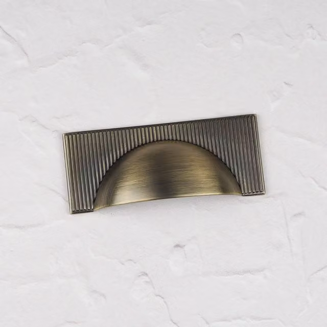 Handle & Home Ribbed Detailing Handles and Coordinating Knobs in Antique Brushed Brass, Zinc Construction, 45mm and 107mm