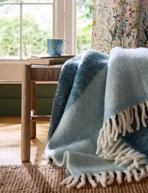 Laura Ashley Home Bronwen Woven Wool Blend Throw in Blue Mix with Fringes