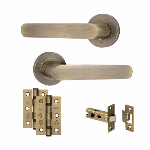 AXS Hardware Harlem Door Handle Pair in Antique Brass with Rose and Door Pack