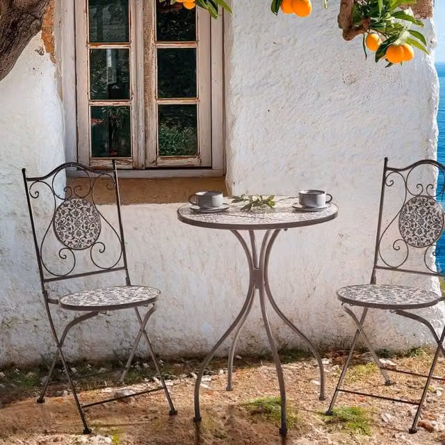 Wyld and Coco Black Metal Bistro Set with Round Ceramic Floral Table and Two Foldable Chairs