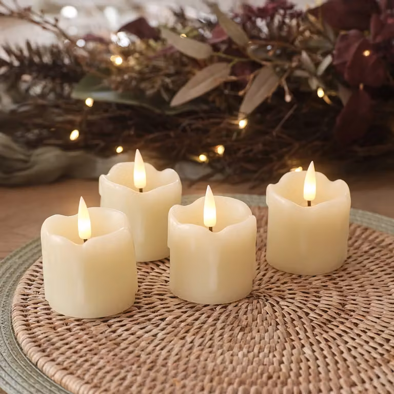 TruGlow® 4-Pack White Dripping Wax LED Votive Candles with Remote Control and Timer