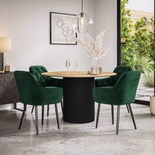 More4Homes Arlo Oak Round Dining Table with Black Legs and Set of 4 Anika Green Velvet Dining Chairs