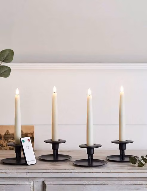 Lights4fun Set of 4 TruGlow Short LED Taper Wax Candles in Ivory