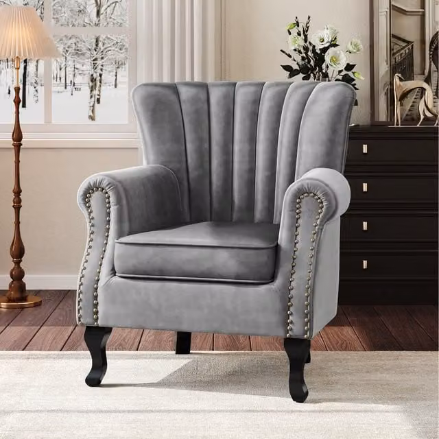Komore Grey Velvet Wingback Armchair with Studded Details